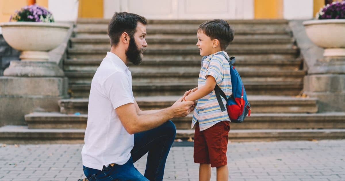 dad with his son trying to get him to comply without a timeout