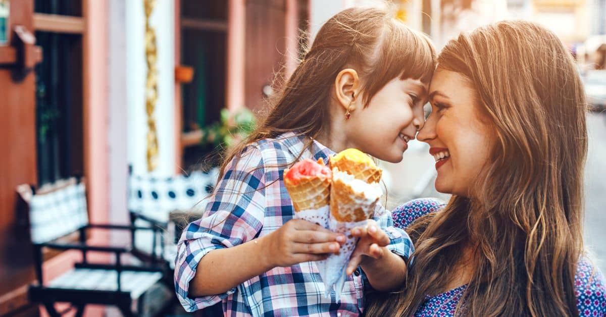 Mom sharing a cute moment with daughter