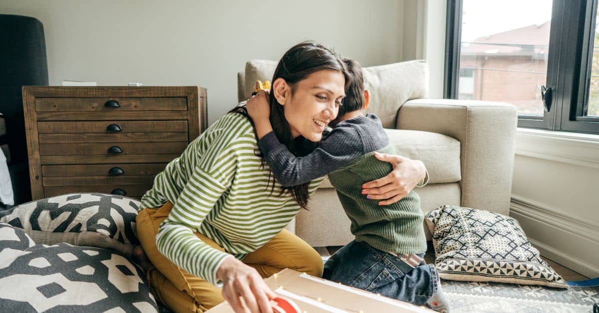 Mother and son hugging